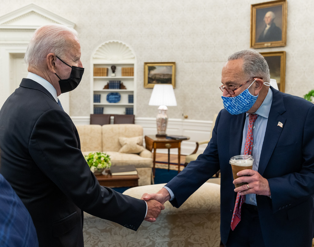 President Joe Biden greets Senate Majority Leader Chuck Schumer, D-N.Y., Friday, July 30 2021, in the Oval Office of the White House. 