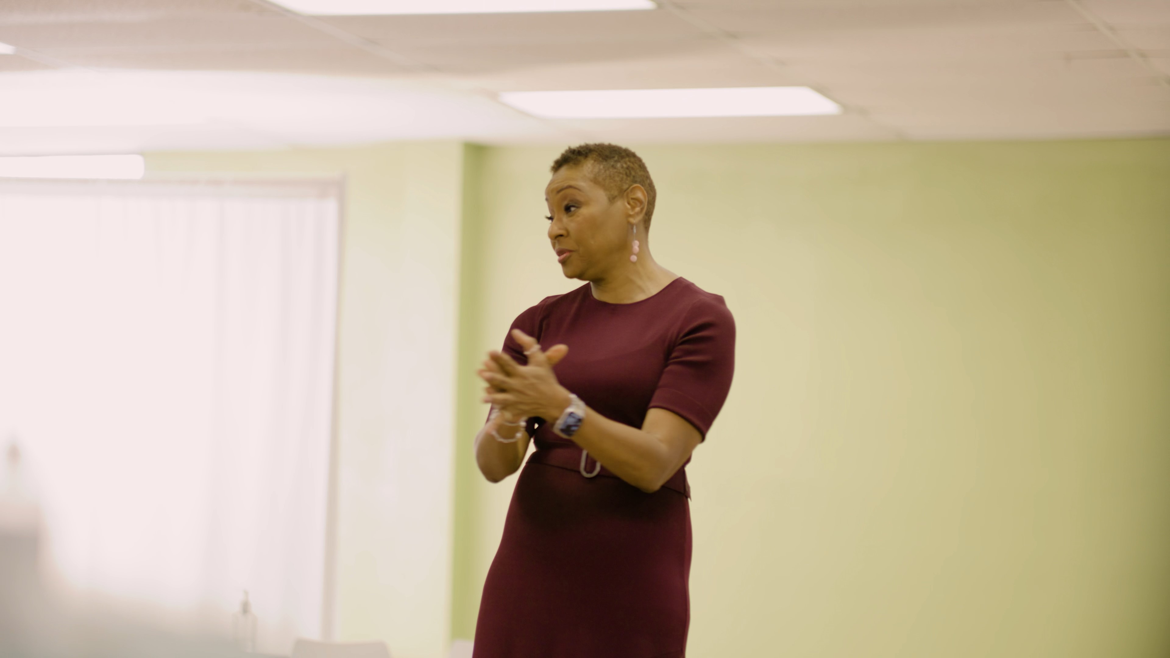 Carla Walker-Miller speaking in a conference room